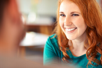 Shes got love written all over her face. Closeup shot of an affectionate young couple on a date.