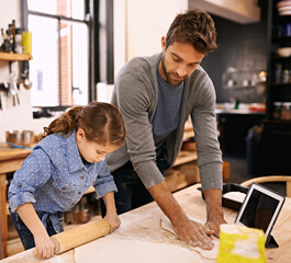 Poster - Shell be a little masterchef one day. a father and daughter working with pizza dough in the kitchen.