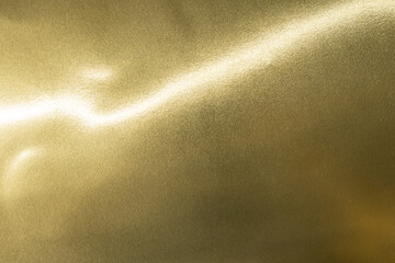 Gold background, gold polished metal, steel texture.