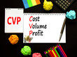 © Dzmitry - CVP cost volume profit symbol. Concept words CVP cost volume profit on white note on beautiful black background. Pencil and pen. Calculator. Business and CVP cost volume profit concept. Copy space.