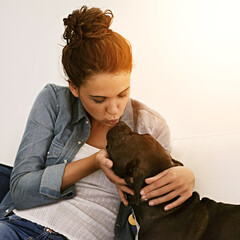 Wall Mural - Happiness is coming home to your dog. a pretty young woman spending time with her dog.