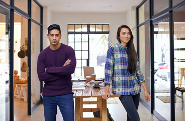 Poster - Theyre the number one design team. Portrait of two young designers in a modern office.