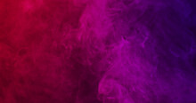 Close Up Of Clouds Of Pink To Purple Smoke With Copy Space Background