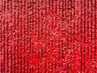 Wall Mural - Colored Textured Background - Red Rough Stucco of Vertical Lines