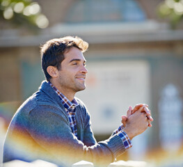 Poster - What a great day to be outside. a handsome young man leaning over a railing.