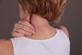 Fototapeta  - Woman touching painful back. Spine osteoporosis, Scoliosis concept