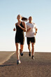 © Nicola K/peopleimages.com - Going the distance together. a young couple exercising outdoors.