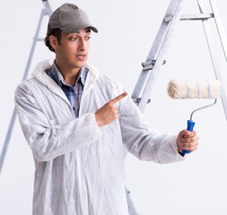 Wall Mural - Painter working at construction site