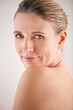 Love the skin youre in. Cropped portrait of an attractive mature woman posing in studio.