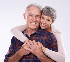 Poster - Shes always got my back. Studio portrait of an affectionate elderly couple against a white background.