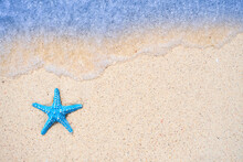 Starfish On Sandy Beaches And Stunning Blue Sea Waves On The Andaman Islands.