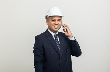 Wall Mural - Businessman manager owner real estate working with cell phone on isolated white background. Cooperation of architect designer. Engineer with smartphone checking at working construction site