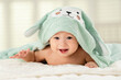 © View Stock - Playing cute baby lying on the bed