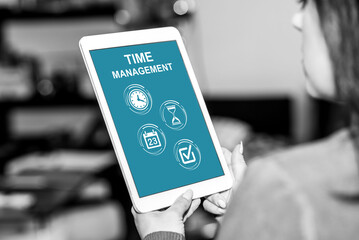 Time management concept on a tablet