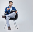© Lune/peopleimages.com - Human resources, questions and businessman with notebook for interview process in studio on grey background. Recruiter, asian male and recruitment process, negotiation and onboarding discussion