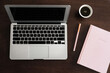 © Austockphoto - laptop with journal and coffee