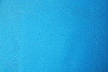 Light Blue Cloth With Lint As Background, Top View. Before Using Fabric Shaver