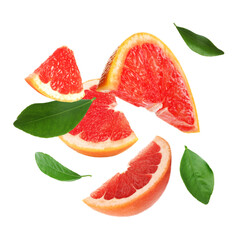 Wall Mural - Cut fresh grapefruit and green leaves flying on white background