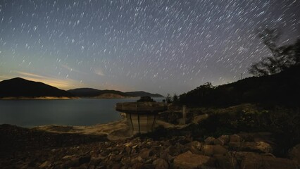 Poster - starry sky night lapse above high island west dam reservoir sai kung hong kong