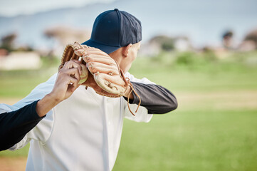 Pitcher, back view or sports man in baseball stadium in a game on training field outdoors. Fitness, young softball athlete or focused man pitching or throwing a ball with glove in workout or exercise