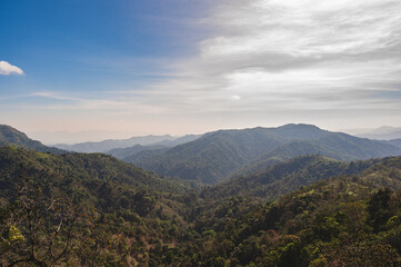 Wall Mural - Beautiful landscape view and layers mountains on khao khao chang phueak mountian.Thong Pha Phum National Park's highest mountain is known as Khao Chang Phueak