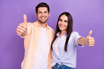 Aufkleber - Photo of positive two young attractive woman with husband thumbs up recommend new freelance job website isolated on purple color background