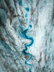 Sticker - Vertical shot of icy glaciers and wild nature in Alaska in daylight