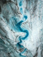 Poster - Vertical shot of icy glaciers and wild nature in Alaska in daylight