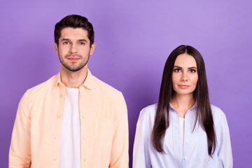 Canvas Print - Portrait of two concentrated focused people calm face isolated on pastel purple color background