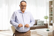 © Ljupco Smokovski - Mature man with a big belly trying to button a tight shirt