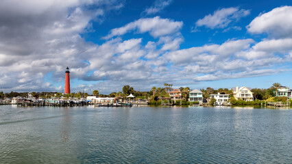 Wall Mural - Ponce Inlet Lighthouse in harbor at sunny day, Daytona Beach, Florida, USA.