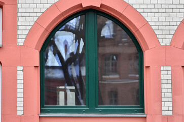 Wall Mural - view of brick building with color window