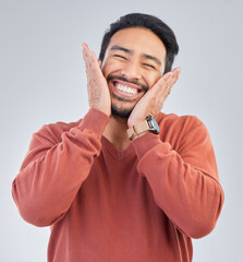 Wall Mural - Happy, smile and face of man on a white background with emoji, comic and facial expression in studio. Wow mockup, omg surprise and isolated excited male with good news, success and winner reaction