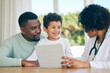 © C.D./peopleimages.com - Pediatrician tablet, dad and child with a smile from patient results with good news at a hospital. Happy kid, father and doctor in a clinic consultation office with a healthcare worker and family