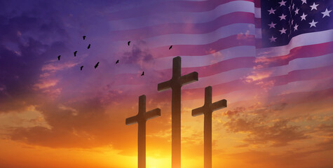 good friday concept. cross in arm on sky background. usa flag. 3d illustration.