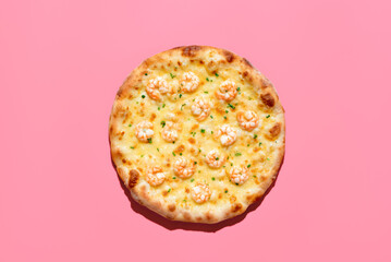 Wall Mural - Shrimps pizza above view, isolated on a pink background