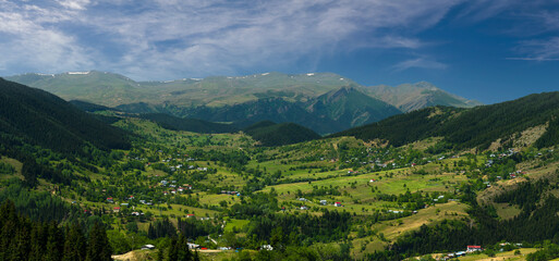 Sticker - High plateaus in spring. Black Sea region. Panoramic view of Savsat highlands . The view of the plateau houses from the Savsat cruise hill. Yavuzkoy, Artvin ,Turkey
