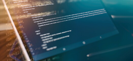 CSS, JavaScript and HTML usage. Monitor closeup of function source code. Abstract IT technology background. Software source code.