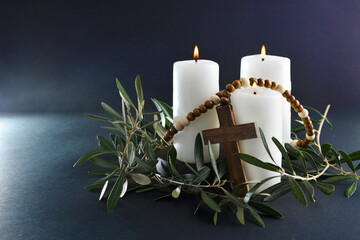 Wall Mural - Easter religious background with candles cross and olive branches