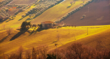 Countryside landscape in autumn, agricultural fields among hills