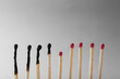 © New Africa - Burnt and whole matches on light grey background, closeup. Stop destruction by breaking chain reaction concept