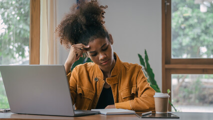 Wall Mural - migraine headache, Young african american university foreign exchange students study online on laptop pc english language class by international specialists at cafe.