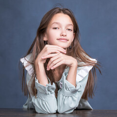 Wall Mural - Studio portrait of a young teen girl