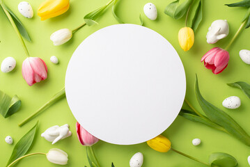 Wall Mural - Easter decorations concept. Top view photo of white circle fresh colorful tulips easter eggs and ceramic bunny on isolated light green background with copyspace