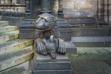 Wall Mural - Lion with a goat sculpture in front of Bremen Cathedral - Bremen, Germany