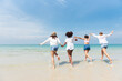 © Platoo Studio - Holiday summer activity, Diverse teenage friends running into the sea. Group of friends playing on the beach. Lifestyles on vacation and holiday, Travel concept.