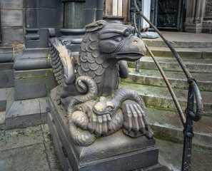 Wall Mural - Eagle with a snake sculpture in front of Bremen Cathedral - Bremen, Germany