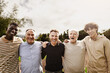 © Alessandro Biascioli - Happy multigenerational group of men with different ethnicities having fun smiling in front of camera at park - People diversity concept