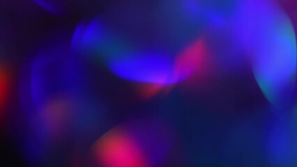 Canvas Print - Neon Bokeh Circular Motion Abstract Background. Movement of defocused circles in blue, purple, red and green colors. Glowing vibrant bokeh lights in a 4K moving background.