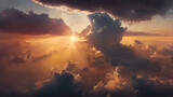 Fototapeta  - An aerial shot above beautiful sunset clouds with sun shining on horizon, detailed picturesque view, amazing photo of cloudscape with beautiful light rays.